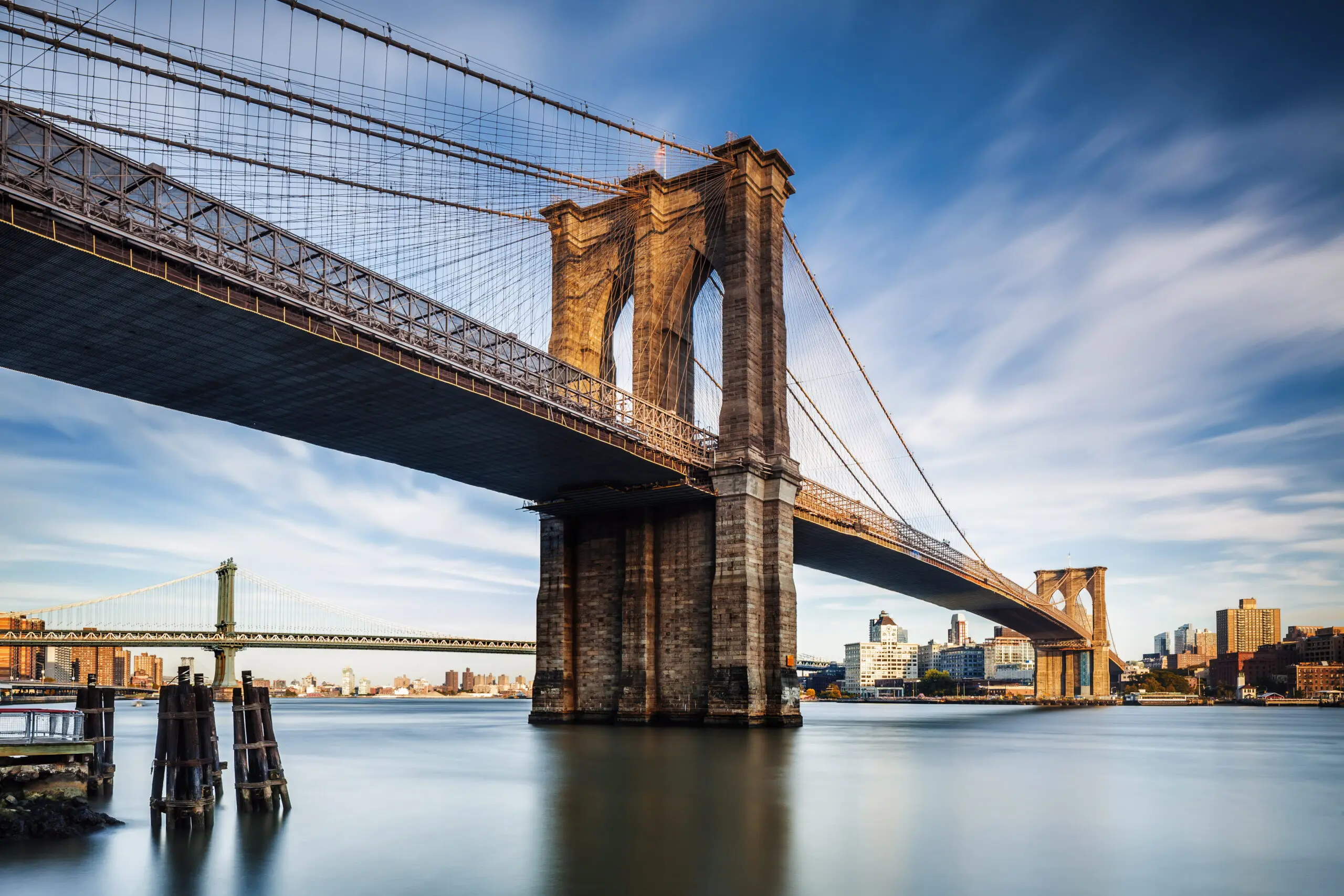 Wandbild (4609) Bartuccio A. – Brooklyn Bridge präsentiert: Wasser,Architektur,Landschaften,Häuser,Skylines,Sonstige Architektur,Sehenswürdigkeiten,Brücke,Amerika,Luftaufnahmen,Bäche und Flüsse,Meere,Wasserspiegelungen
